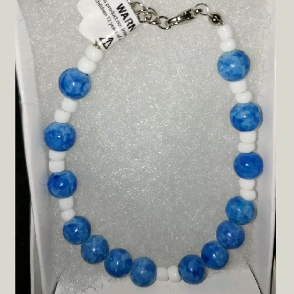 Handmade 7" bracelet with Glass Blue Beads and white seed spacers